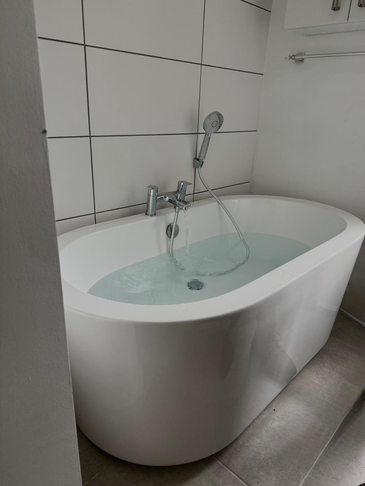 Freshly installed freestanding bathtub